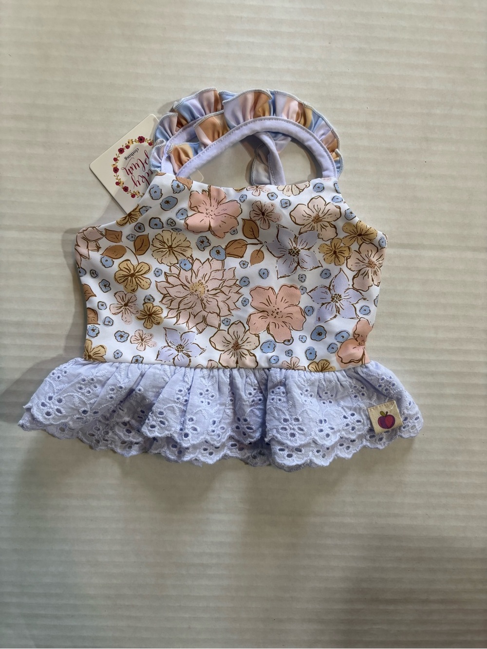 NWT cheeky plum Lilac Floral Ruffle swim top with Pastel Flowers 12/18 months